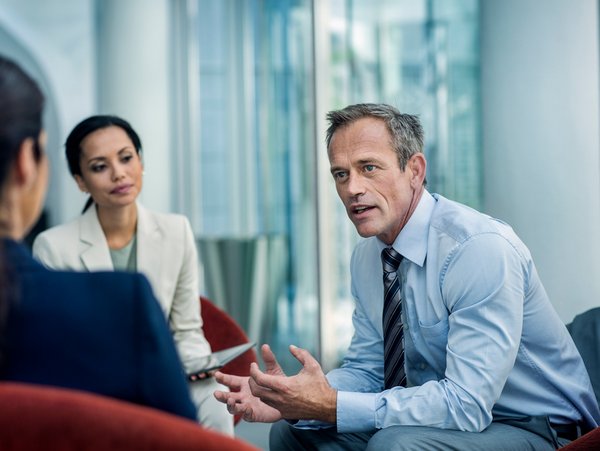 Several people are engaged in a conversation.