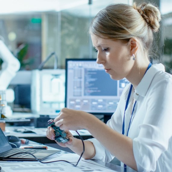 A woman works in a hardware laboratory.