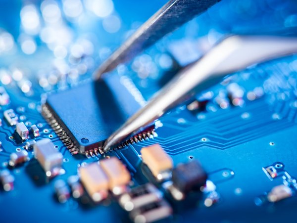 Microchip is inserted with tweezers